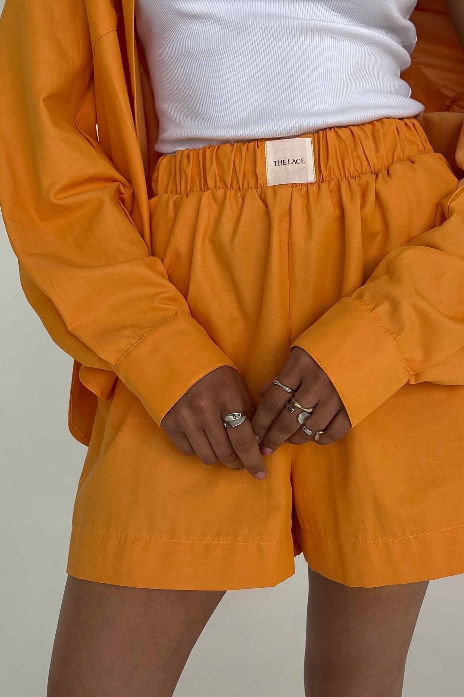 Oversized light cotton shorts in orange