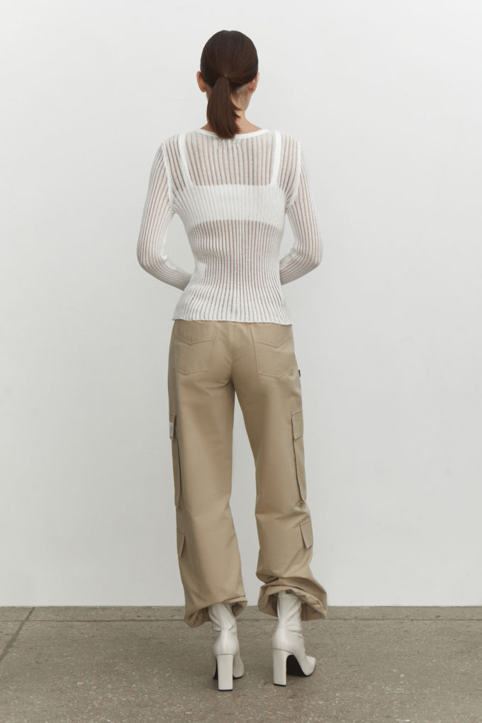 Translucent knitted crew neck jumper with buttons in milk photo 2