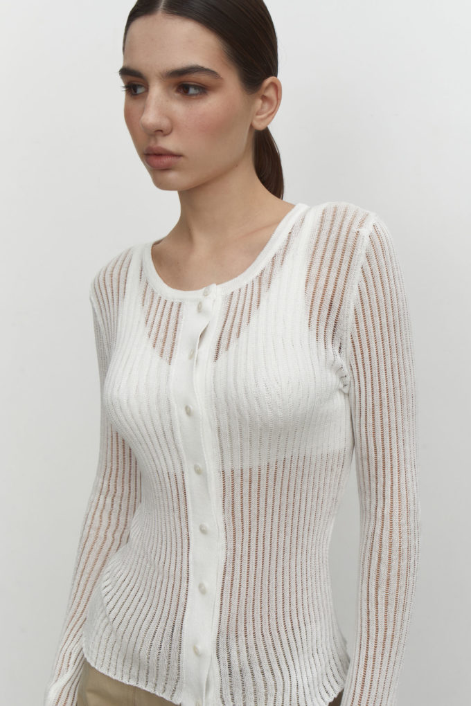 Translucent knitted crew neck jumper with buttons in milk photo 3