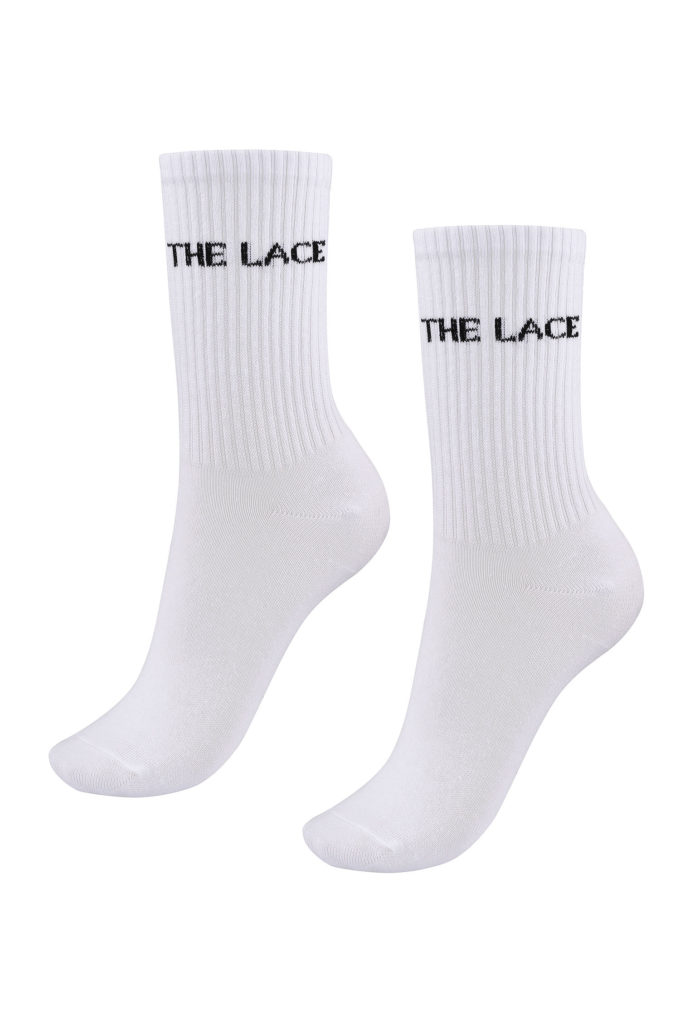 White socks with a logo photo 2