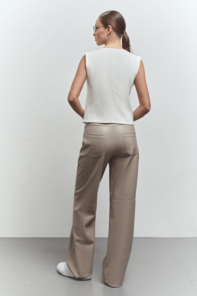 Faux leather straight pants in cream photo 2
