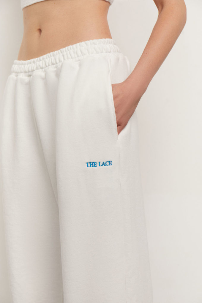 Straight fit pants with embroidery in milk photo 4