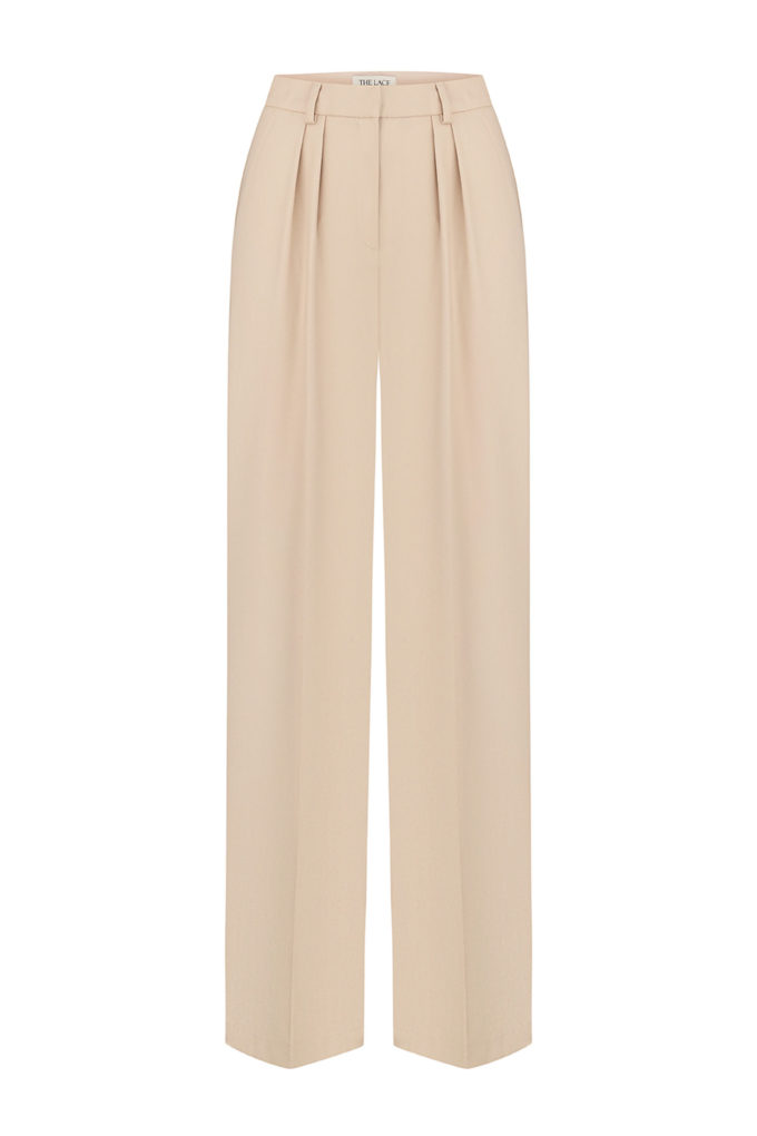 Palazzo pants with a low fit in sand color photo 4