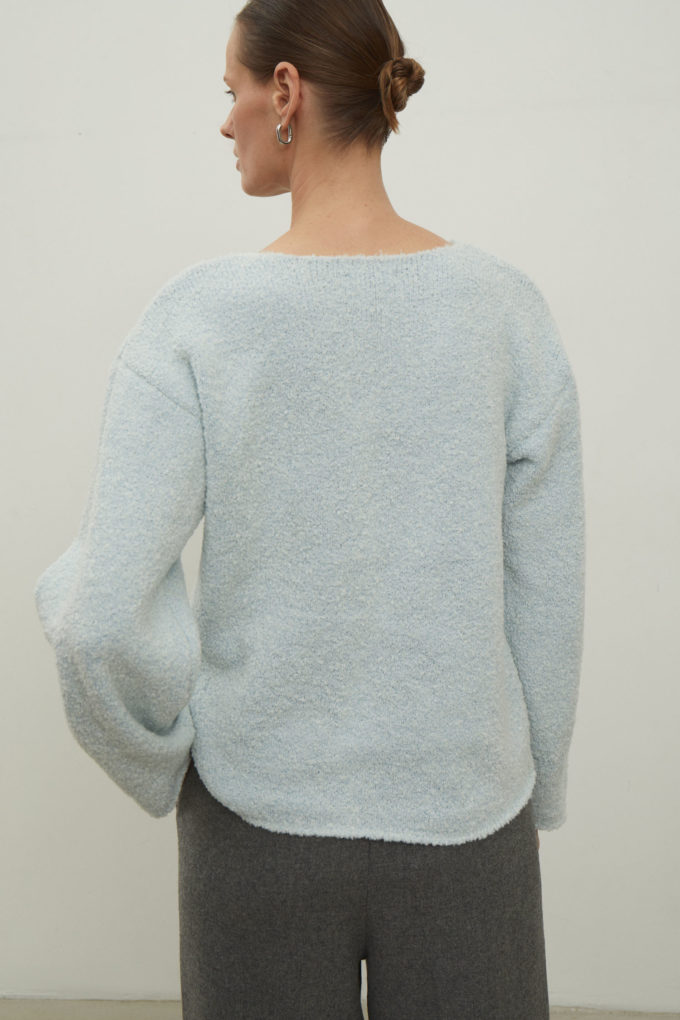 Knitted free cut boucle sweater in blue color photo 2