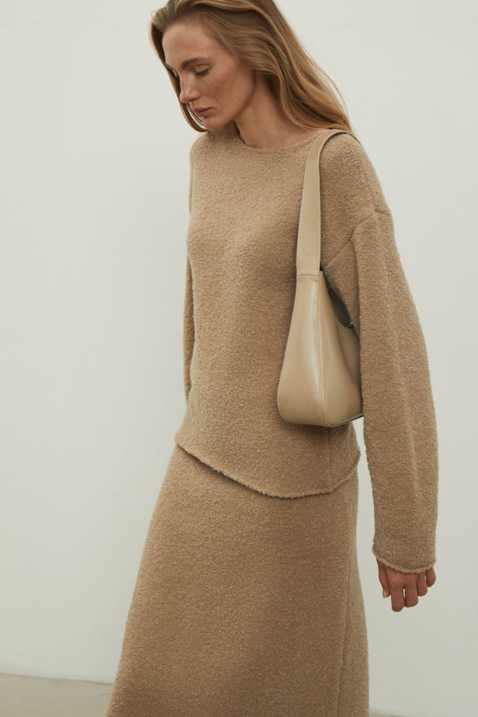 Midi knitted skirt with a straight cut in beige color photo 4