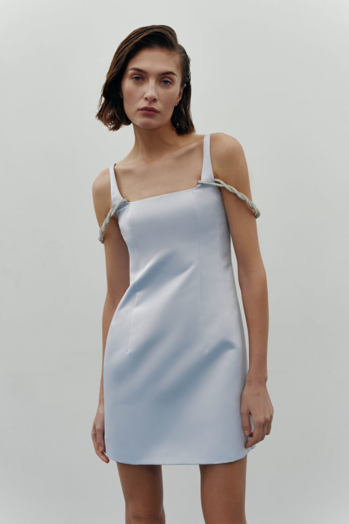 Mini dress made of dense satin with straps in light blue photo 3
