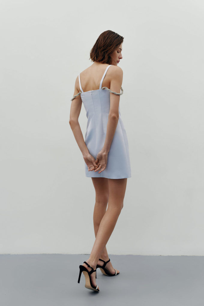 Mini dress made of dense satin with straps in light blue photo 4