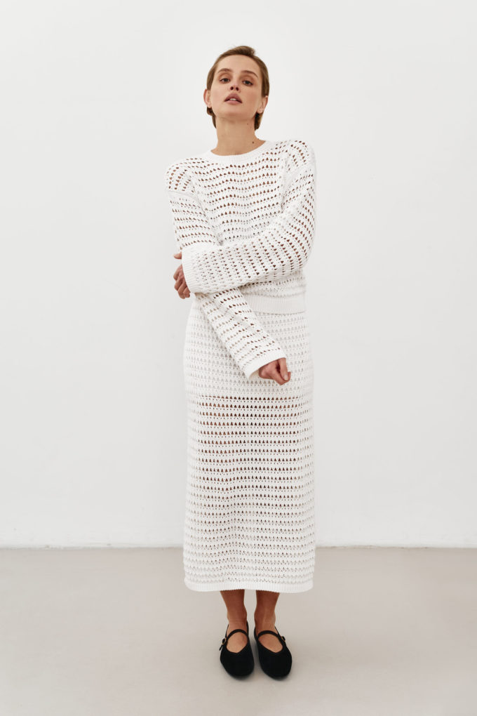 Milk knitted skirt with openwork knitting photo 2