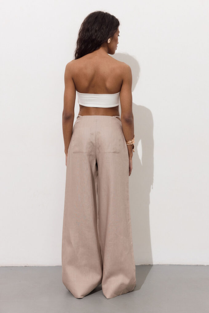 Linen pants with a decorated belt in beige photo 3