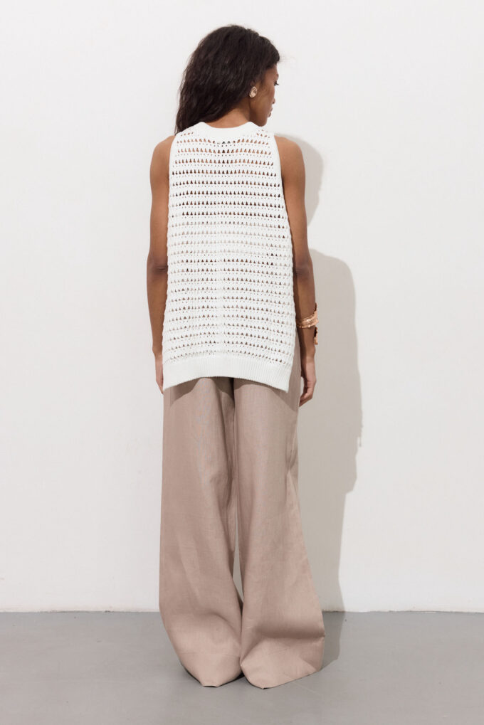 Knitted openwork top with slits in milk photo 3