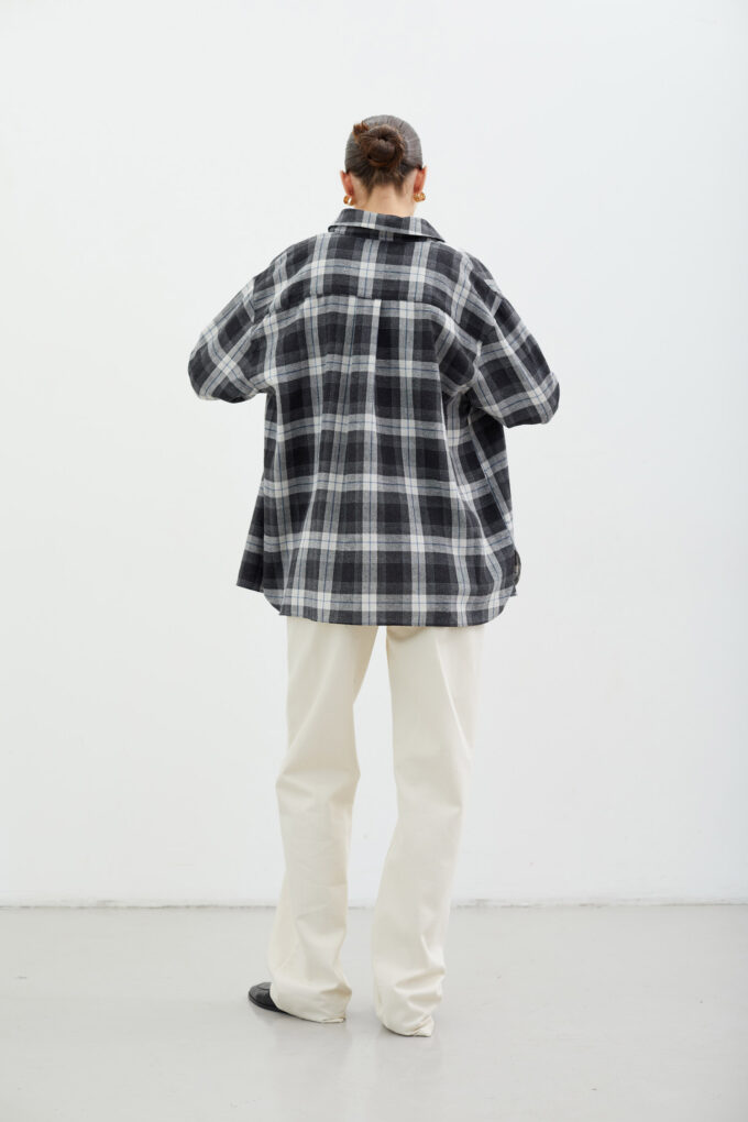 Black shirt with patch pocket in a white check photo 3