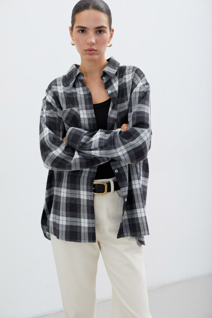 Black shirt with patch pocket in a white check photo 4