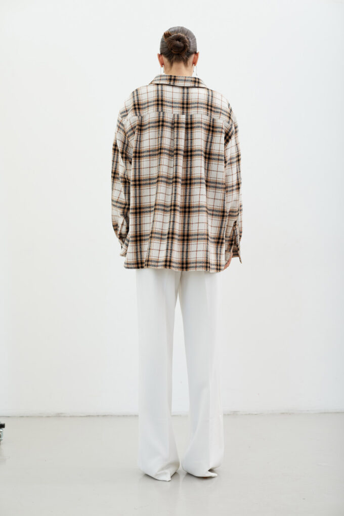 Сheckered warmed shirt with a patch pocket in beige color photo 4