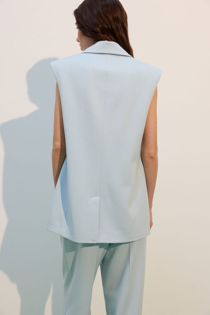 Elongated vest in light blue photo 4