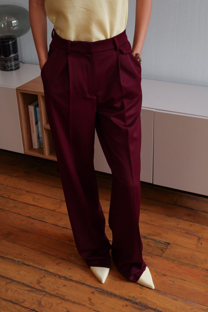 Burgundy palazzo pants with decorative flap photo 2