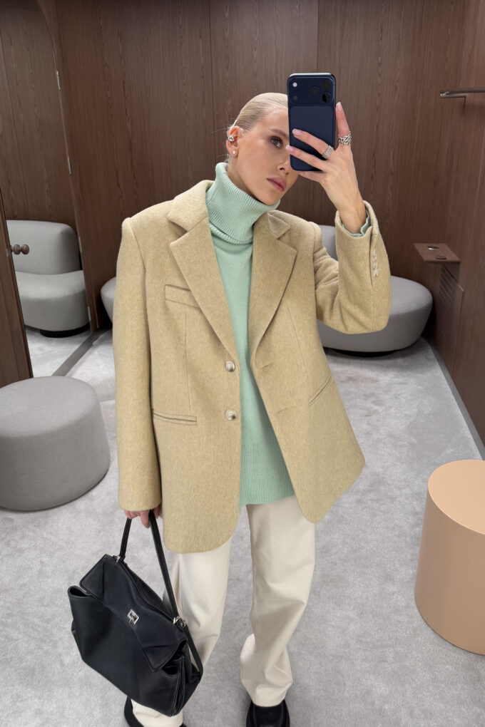 Mint knitted sweater with a voluminous neck photo 2